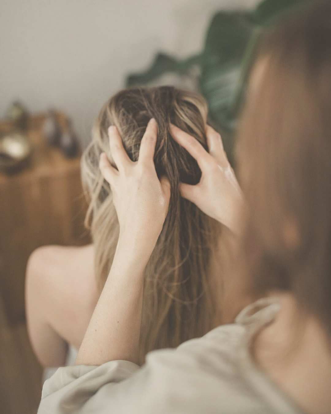 woman receiving an Ayurvedic Mukhabhyanga - head, scalp and face massage