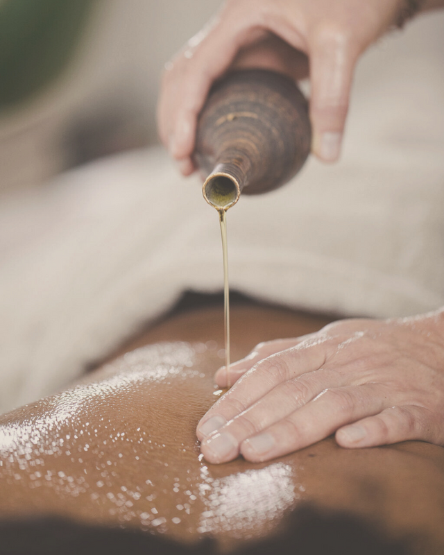 Ayurvedic oil treatment - udvartana, detoxing power body massage